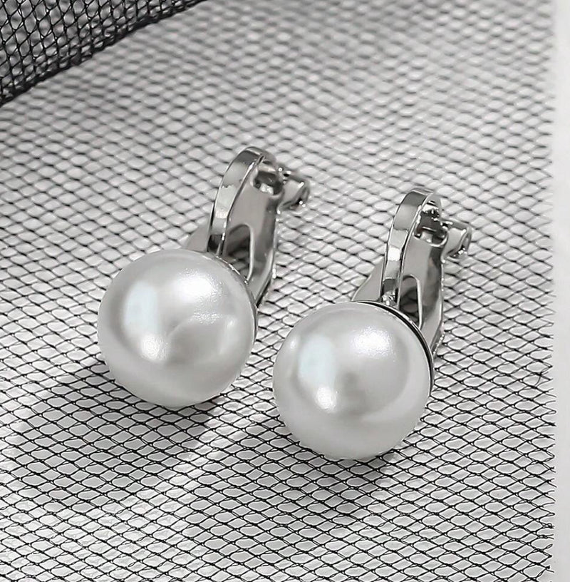 Clip on 1/2" silver and .05 white pearl round button style earrings