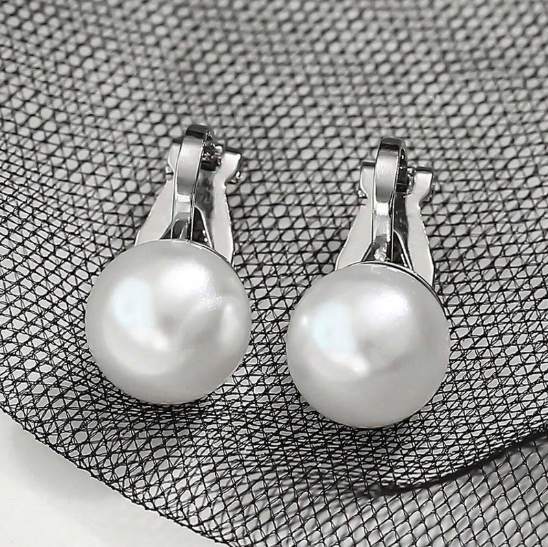 Clip on 1/2" silver and .05 white pearl round button style earrings