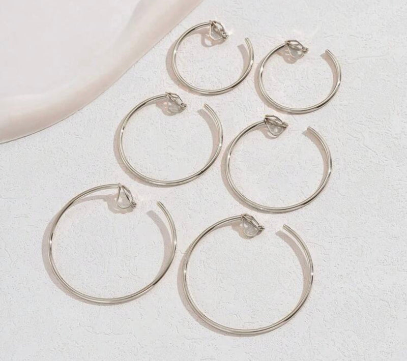3 Pairs of clip on shiny silver open back hoop earrings