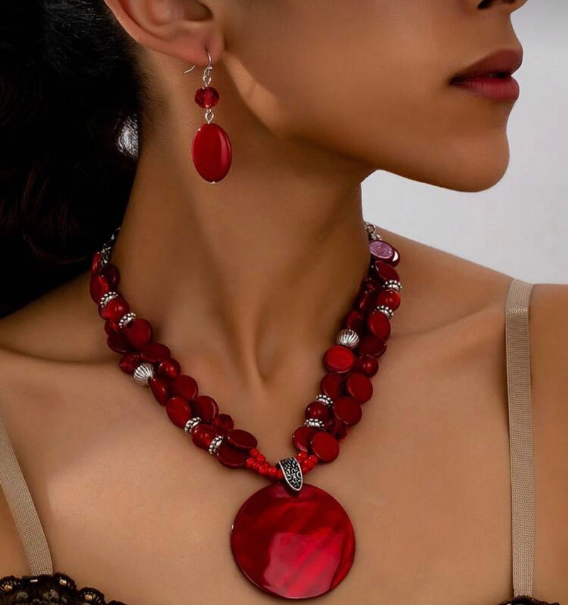 Pierced silver and white shell bead necklace and earring set