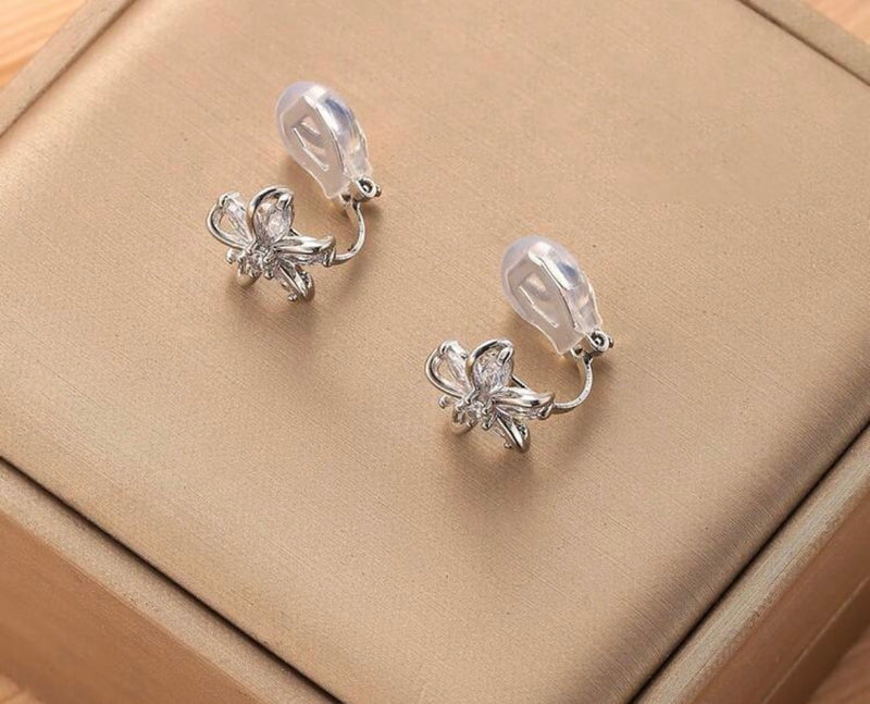 Clip on 1/2" small silver clear stone flower button style earrings