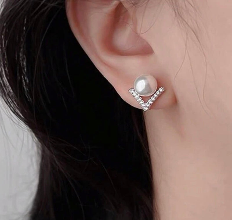 Clip on 1 1/4" comfort fit coil silver and clear stone V and pearl earrings