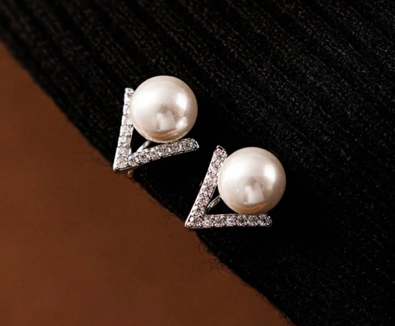 Clip on 1 1/4" comfort fit coil silver and clear stone V and pearl earrings