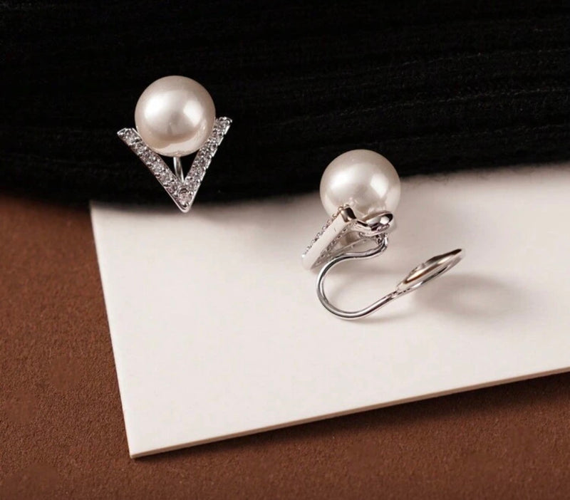 Clip on 1 1/4" comfort fit coil silver and clear stone V and pearl earrings