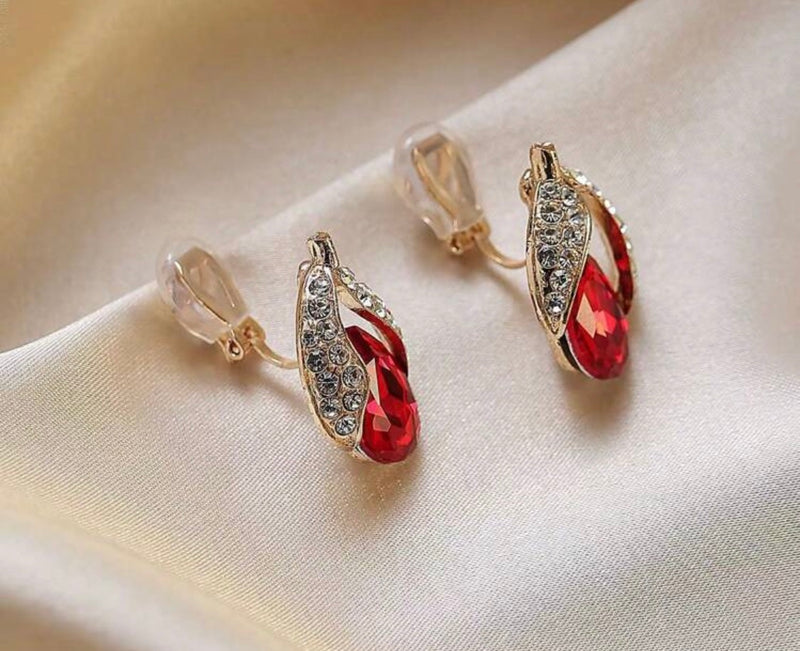 Clip on 1" gold, red and clear stone cutout teardrop earrings