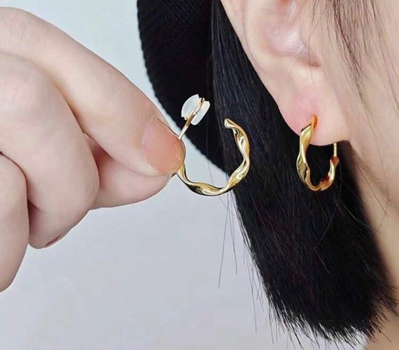 Clip on 3/4" silver comfort fit shiny twisted hoop earrings