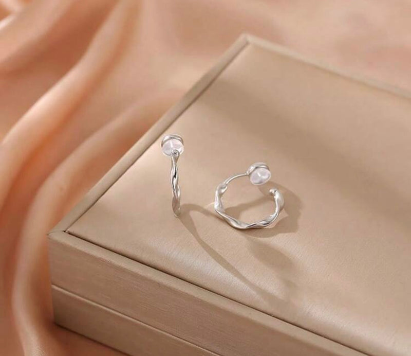 Clip on 3/4" silver comfort fit shiny twisted hoop earrings