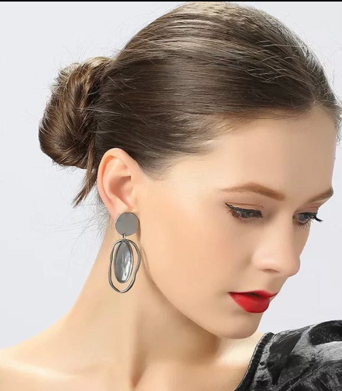 Clip on 2 1/2" matte rose or gray odd shaped cutout dangle earrings