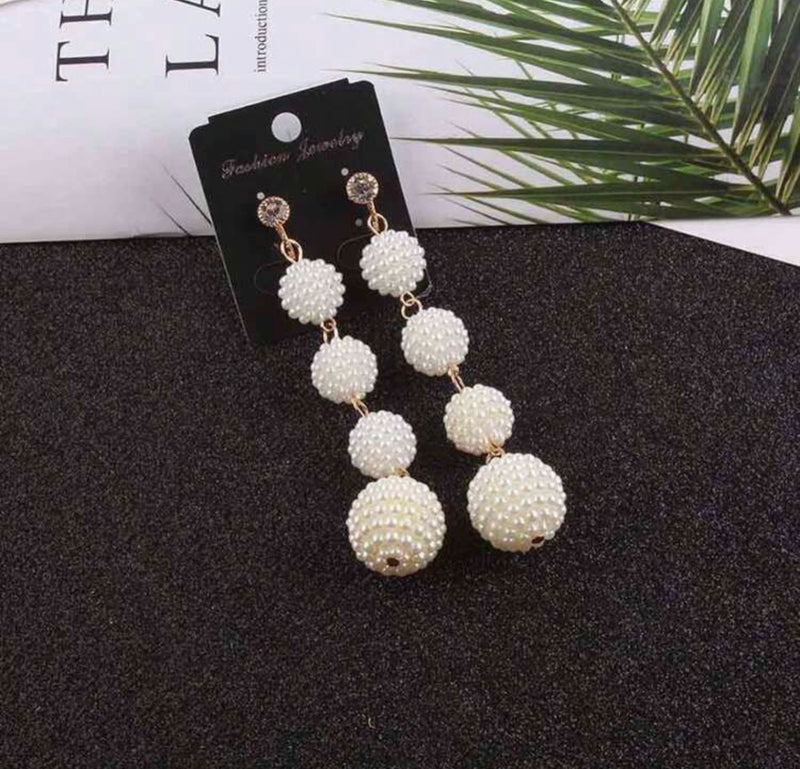 Clip on 3 1/2" long gold seed bead cream pearl ball earrings with clear stone