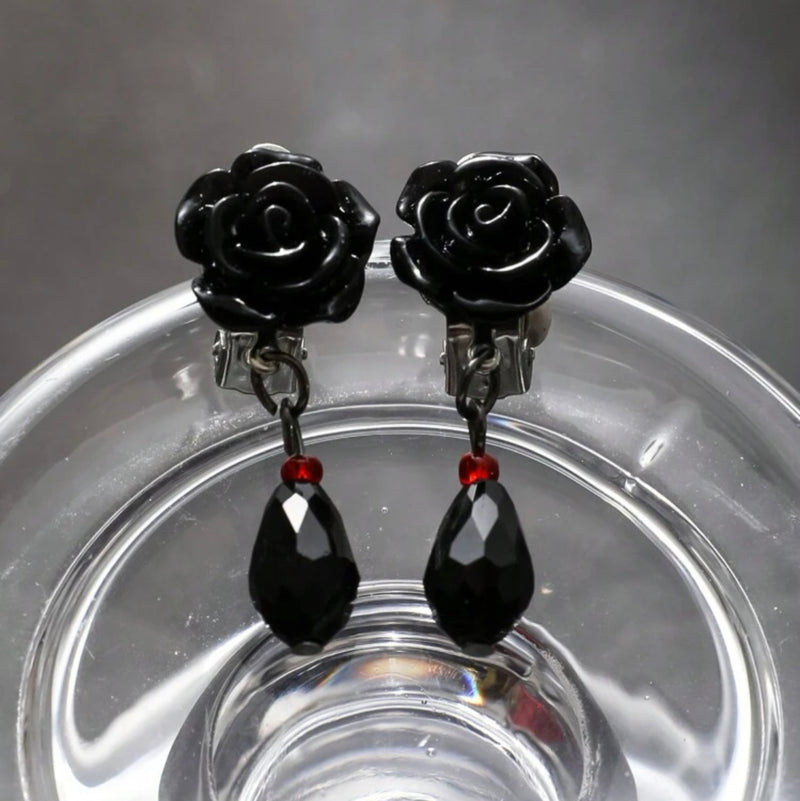 Clip on 1 3/4" silver, black flower and red bead dangle earrings