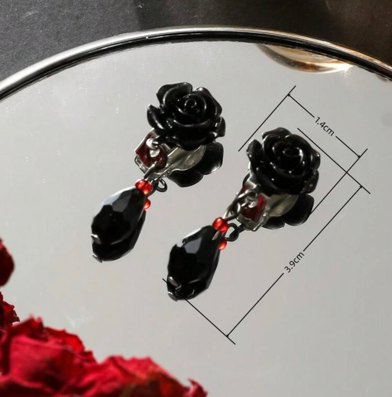 Clip on 1 3/4" silver, black flower and red bead dangle earrings