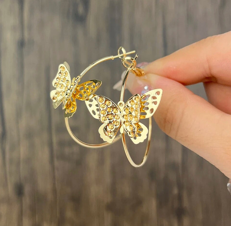 Pierced 1 1/2" gold layered center butterfly hoop earrings