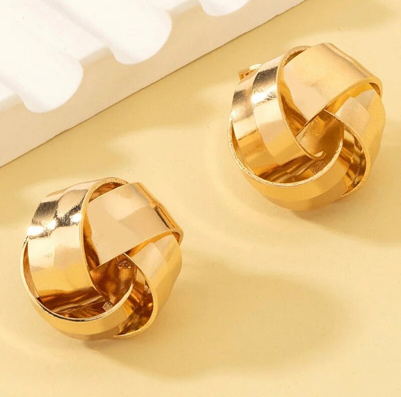 Clip on 3/4" wide gold button style knot earrings