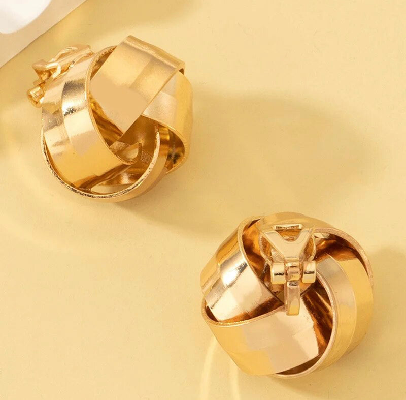 Clip on 3/4" wide gold button style knot earrings