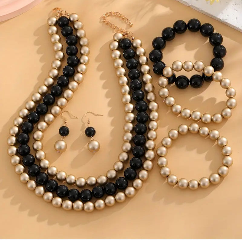 3PC Pierced matte gold and black necklace, bracelet, and earring set