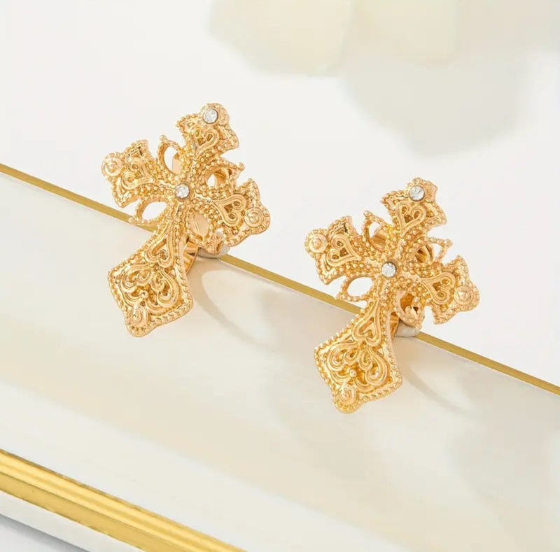 Clip on 1" gold and clear stone pointed cutout edge cross earrings