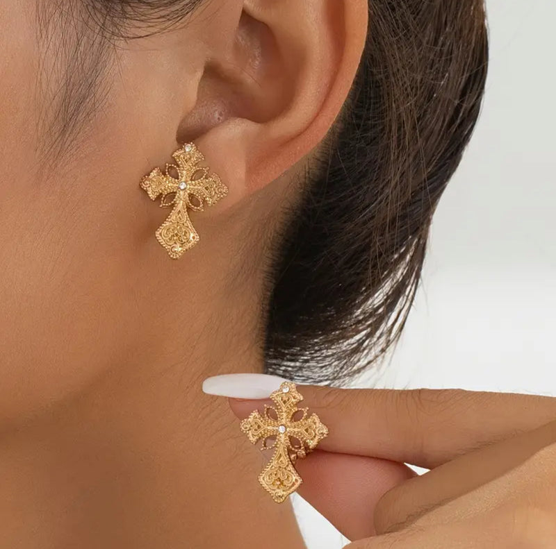 Clip on 1" gold and clear stone pointed cutout edge cross earrings