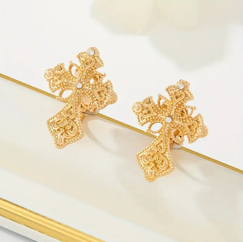 Clip on 1" gold and clear stone pointed cutout edge cross earrings