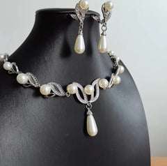 Vintage clip on silver vine, clear stone, and white pearl necklace and earring set