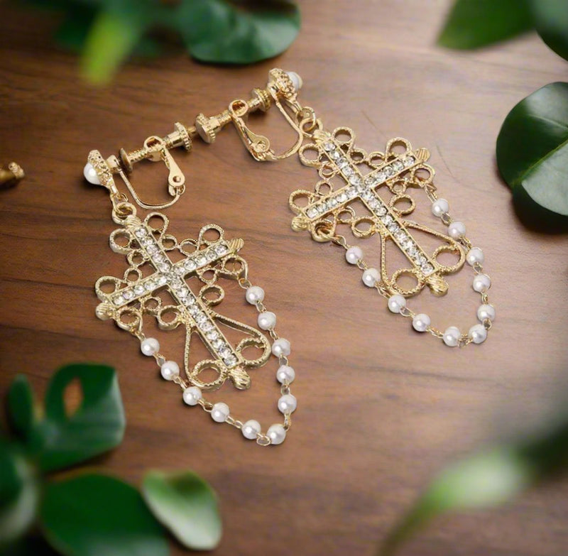 Clip on 2 3/4" gold dangle cross earrings with clear stones and pearls