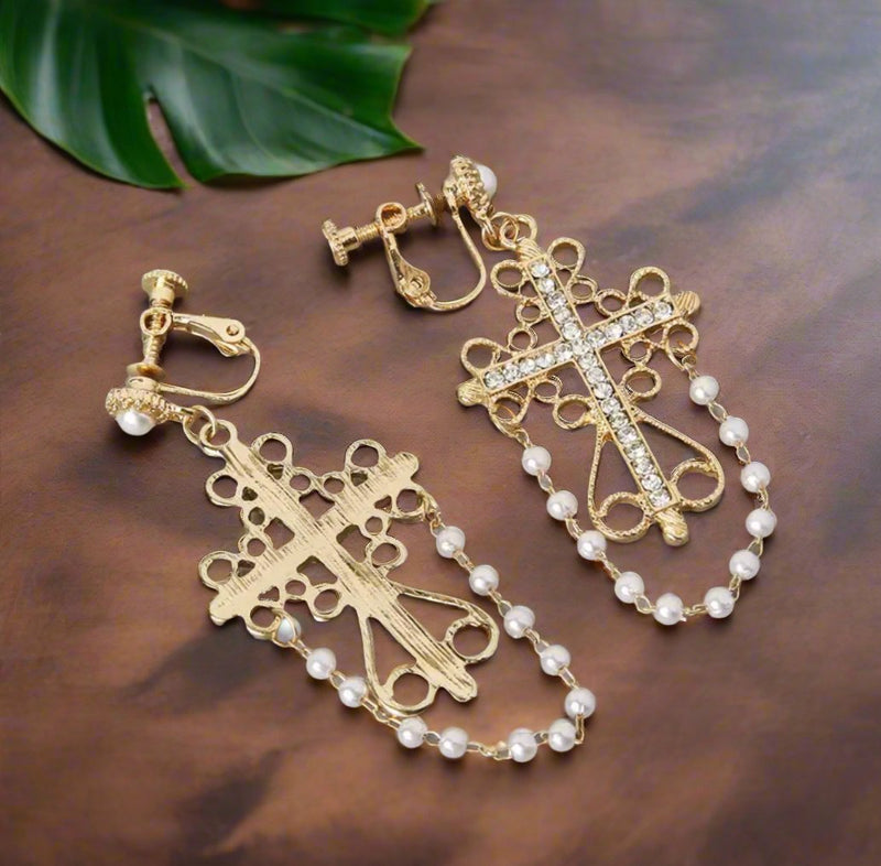 Clip on 2 3/4" gold dangle cross earrings with clear stones and pearls