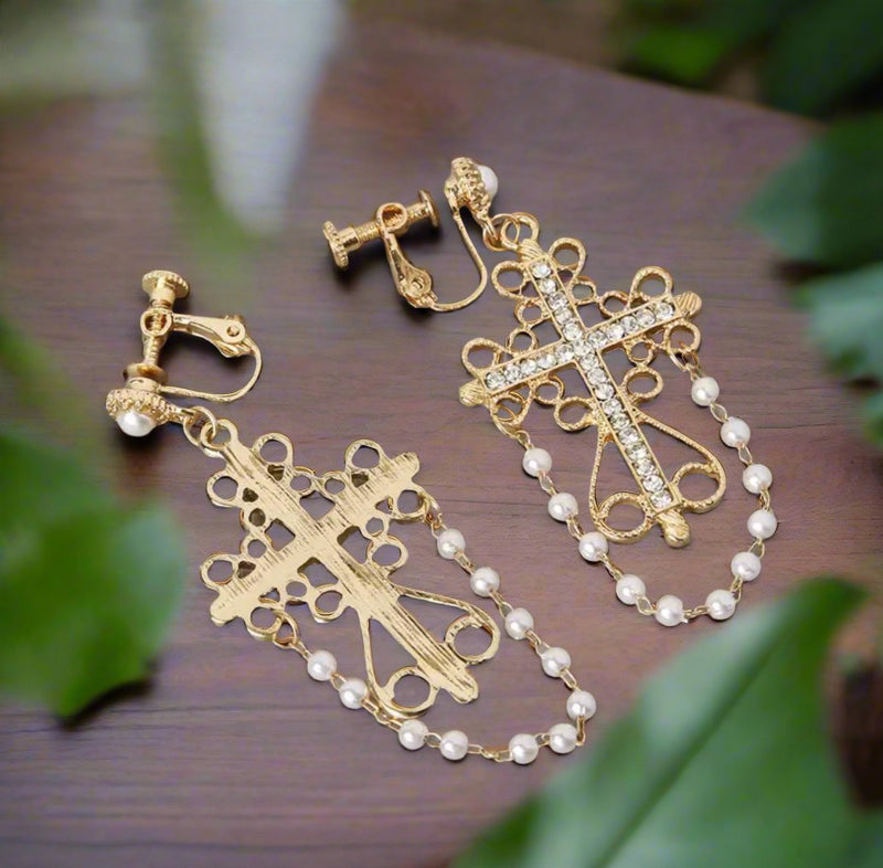 Clip on 2 3/4" gold dangle cross earrings with clear stones and pearls