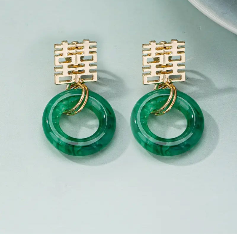 Clip on 1 1/2" gold cutout square top earrings with green dangle hoop