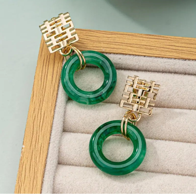 Clip on 1 1/2" gold cutout square top earrings with green dangle hoop