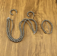 3PC Pierced silver-gunmetal bead necklace, bracelet, and earring set