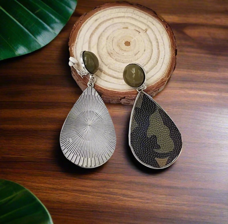 Clip on 3 1/4" long silver and green camouflage print dangle teardrop earrings