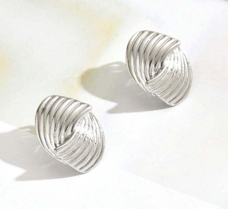 Clip on 1" silver indented woven button style earrings