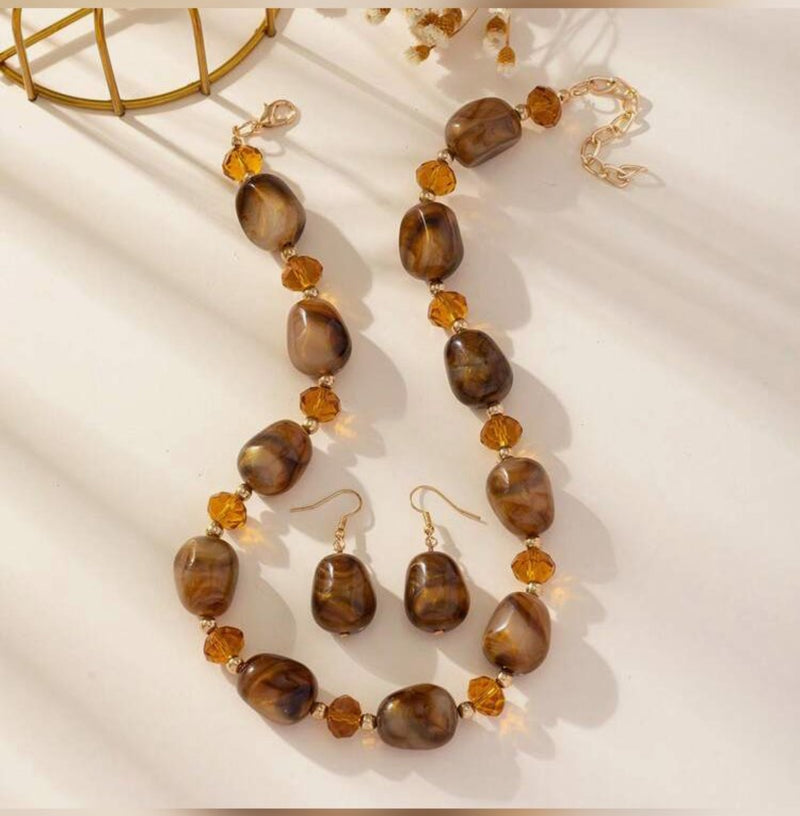 Pierced gold and brown sparkle bead necklace and earring set