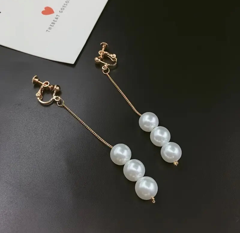 Clip on 3 1/4" long gold chain three pearl dangle earrings