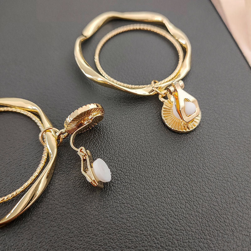 Clip on 2 1/2" black and gold twisted multi hoop earrings