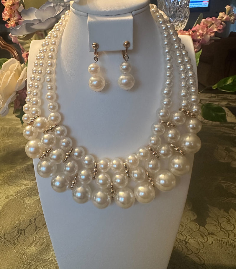 Clip on gold and white pearl statement necklace and earring set