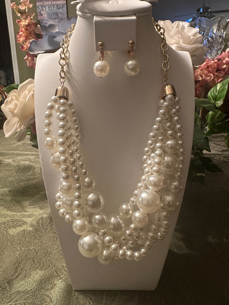 Clip on gold and cream braided pearl necklace and earring set
