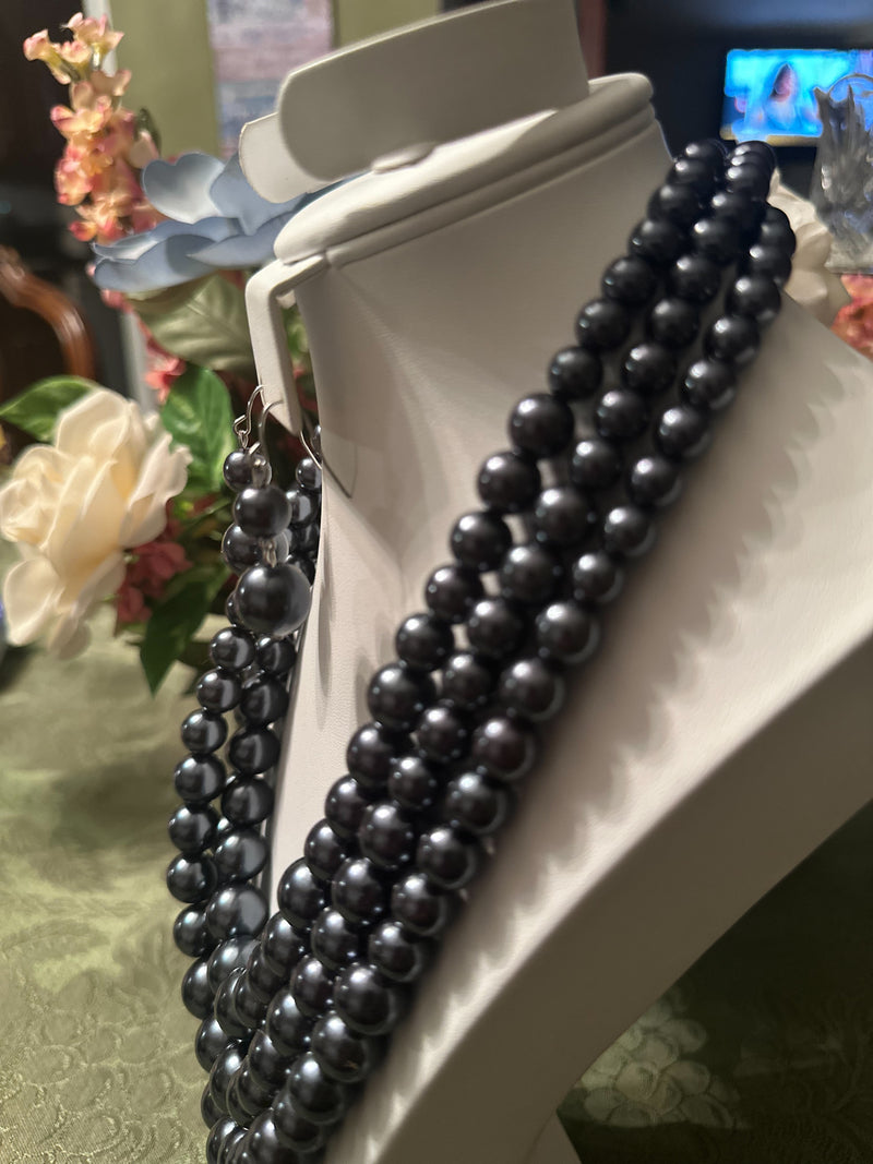 Pierced silver and gray bead three strand necklace and earring set