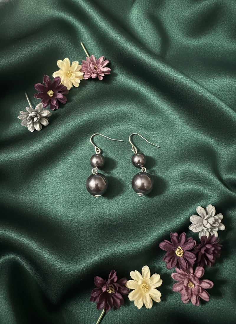 Pierced silver and gray bead three strand necklace and earring set