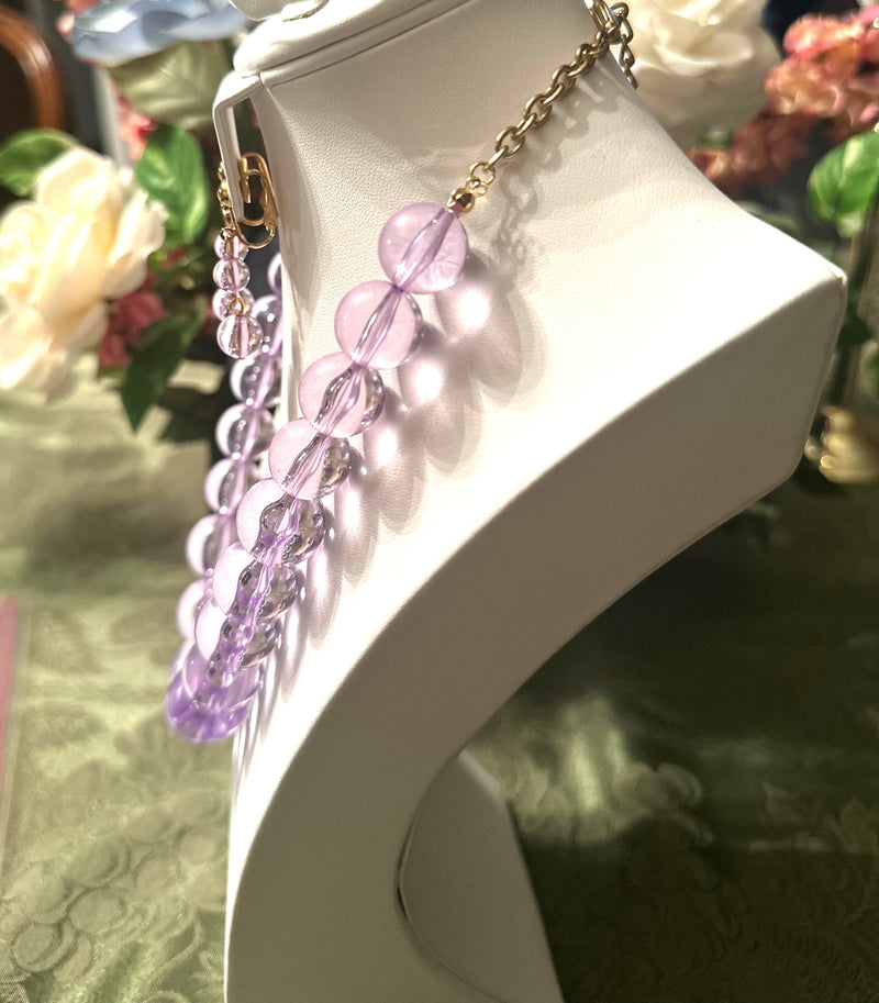 Clip on gold and clear large purple bead necklace and earring set