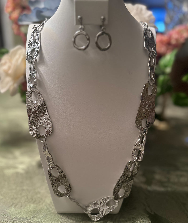 Clip on 2" silver wrinkled odd shaped dangle earrings