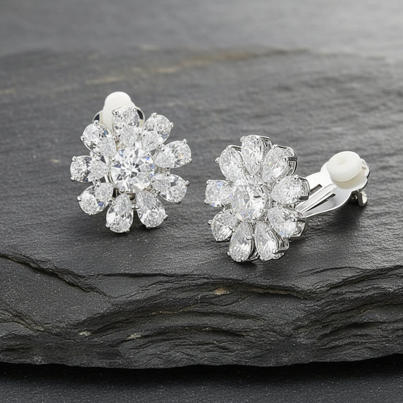 Clip on 3/4" silver and clear stone flower button style earrings