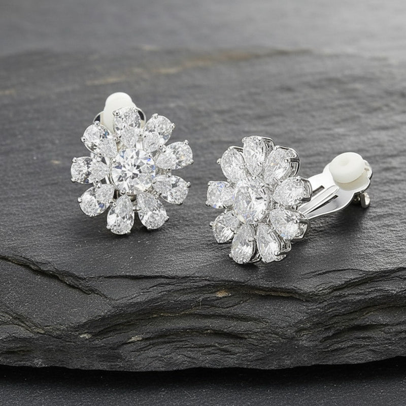 Clip on 3/4" silver and clear stone flower button style earrings