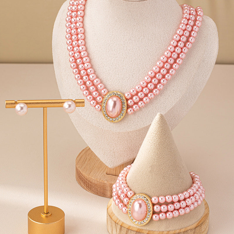 Pierced 2" gold wire and small pearl twisted hoop earrings