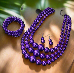 3pc pierced silver, purple three strand bead necklace, bracelet and earring set