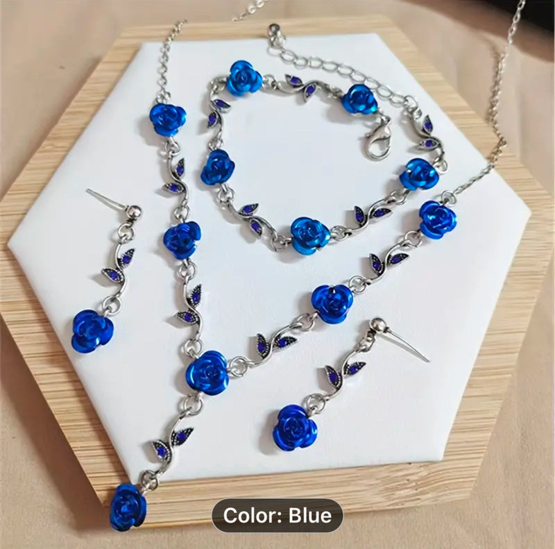 3pc silver and blue flower necklace, bracelet and earring set