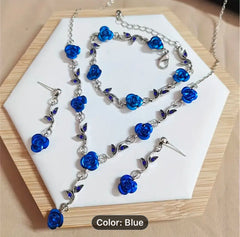 3pc silver and blue flower necklace, bracelet and earring set