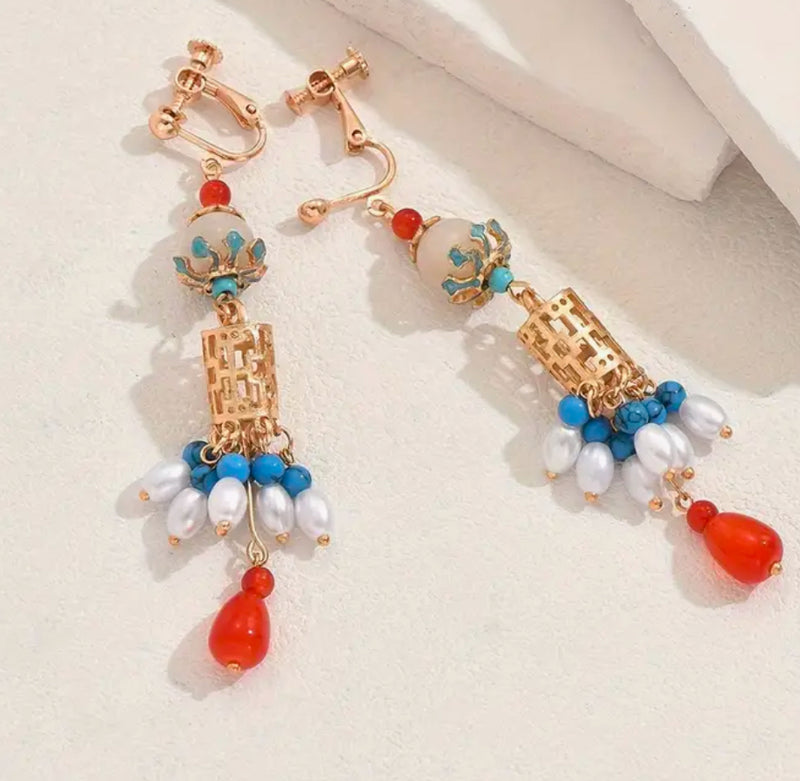 Clip on 3 1/2" long gold, turquoise, multi colored beads and pearl earrings