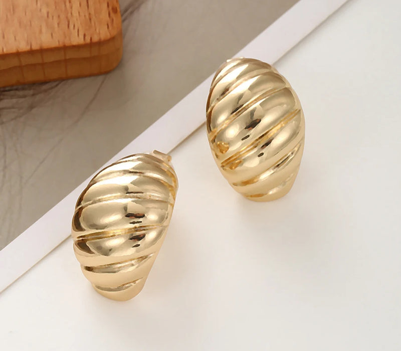 Clip on 1" graduated shiny gold indented scoop button style earrings