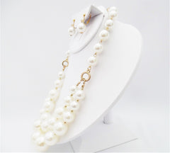 Clip on gold and white pearl layered front necklace and earring set