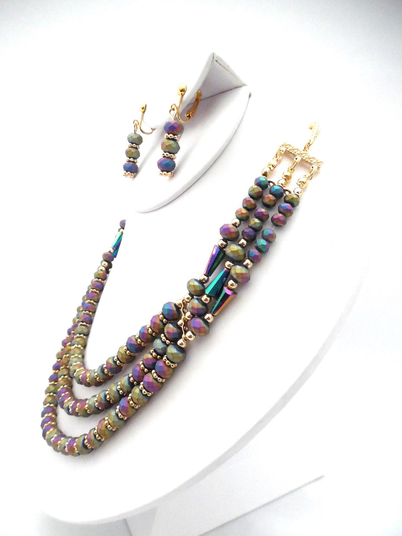 Clip on gold and purple multi colored three strand necklace and earring set